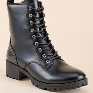 Francesca’s black combat boots